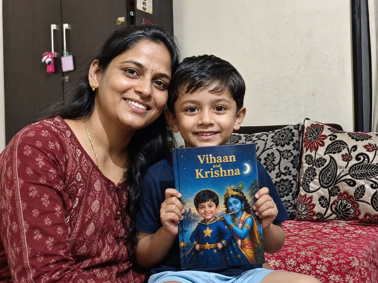 Vihaan holding a personalized StoryOwl book